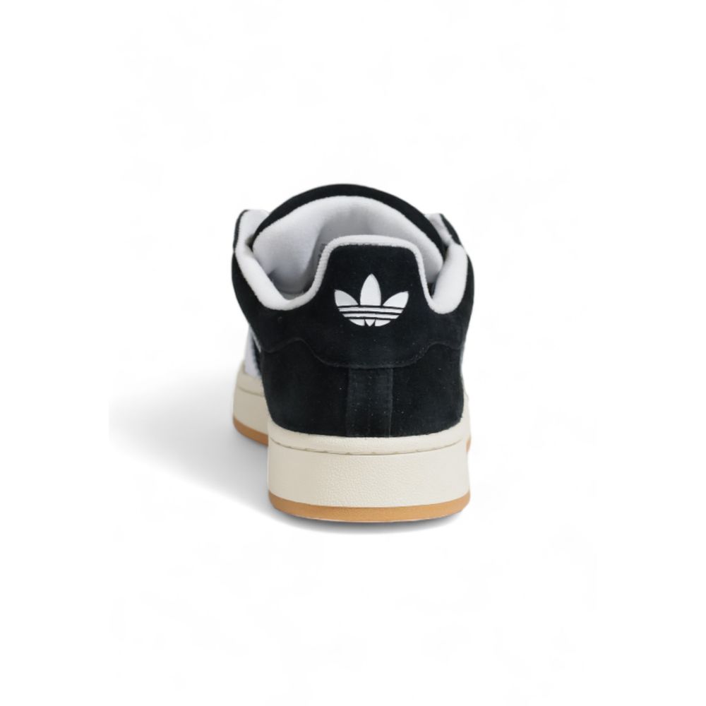 Rear view of Adidas Black Suede Leather Sneaker showcasing logo and design.