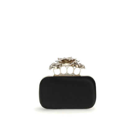 Front view of Alexander McQueen Black Silk Clutch Bag with crystal carnation knuckle handle and gold chain.