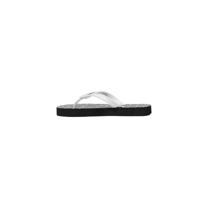 Armani Exchange Black And White Rubber Flip-Flop Sandals, women's, lightweight and durable, perfect for summer beach or pool days.