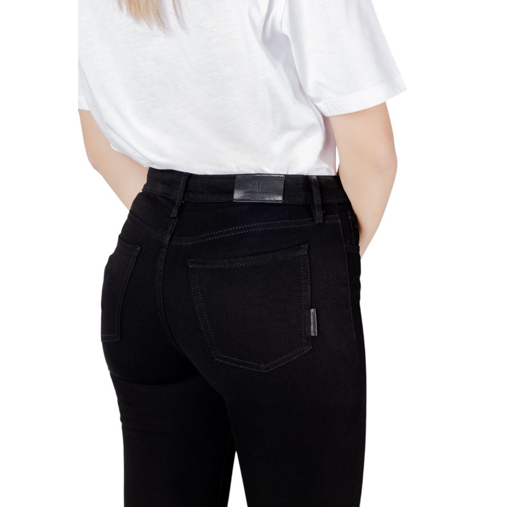 Back view of Armani Exchange Black Cotton Skinny Jeans worn with a white top, showcasing fit and style.