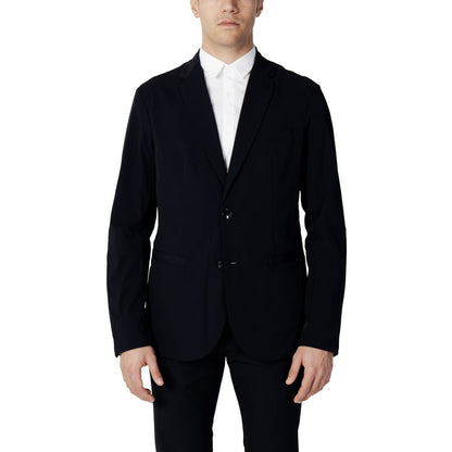 Man wearing Armani Exchange Blue Cotton Blazer with two-button closure and classic lapels, ideal for a sophisticated wardrobe.