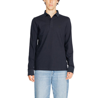 Armani Exchange Blue Cotton Long Sleeve T-Shirt on model, 96% cotton, with tasteful logo, perfect for casual or formal wear. SKU: 8NZF79 ZJ81Z