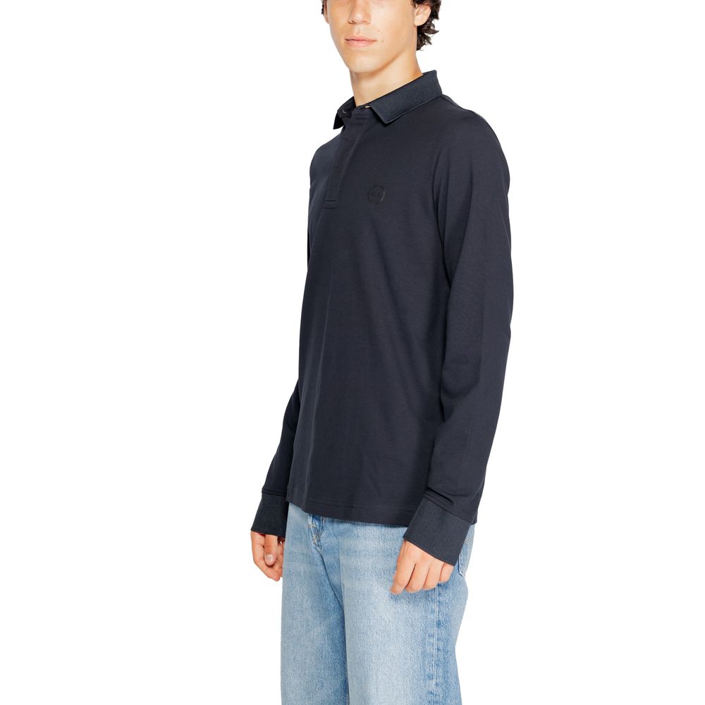 Model wearing Armani Exchange Blue Cotton Long Sleeve T-Shirt with jeans, showcasing the elegant and versatile design.