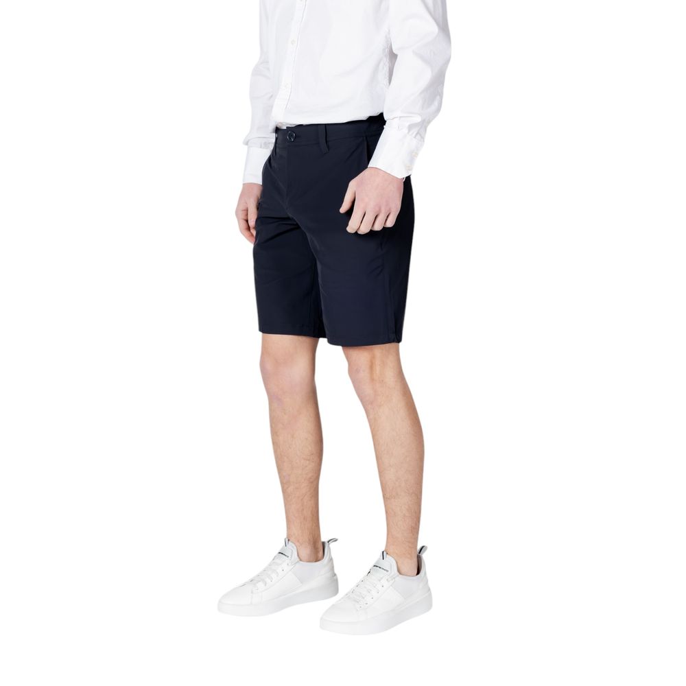 Armani Exchange Blue Polyamide Bermuda Shorts, styled with white shirt and sneakers, offering style and comfort in a modern cut.