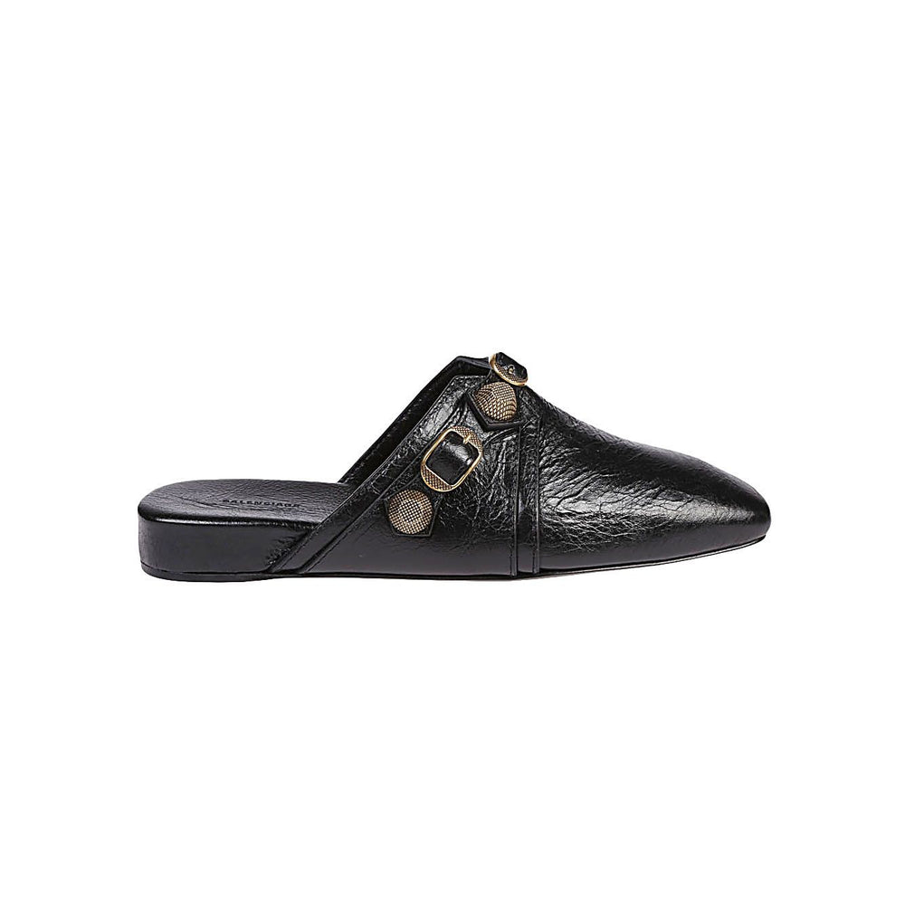 Balenciaga Cozy Cagole leather mules in black with silver studs, buckle closure, square toe, slip-on design, and black leather sole.