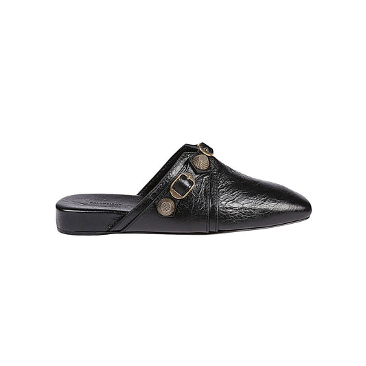 Balenciaga Cozy Cagole leather mules in black with silver studs, buckle closure, square toe, slip-on design, and black leather sole.