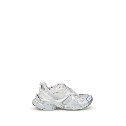 Balenciaga Silver Rubber Athletic Sneakers with grunge-worn aesthetic and logo detailing.