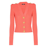 Balmain Long-sleeved twisted knit cardigan in coral pink with logo-embossed buttons and epaulettes, featuring a plunging V-neck design.