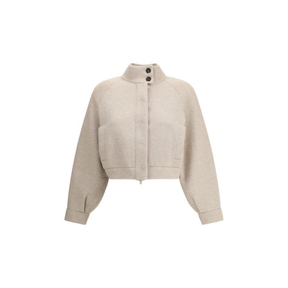 Brunello Cucinelli Beige Cashmere Clothing featuring an oversize cardigan with button and zipper closure, two pockets, and long sleeves.