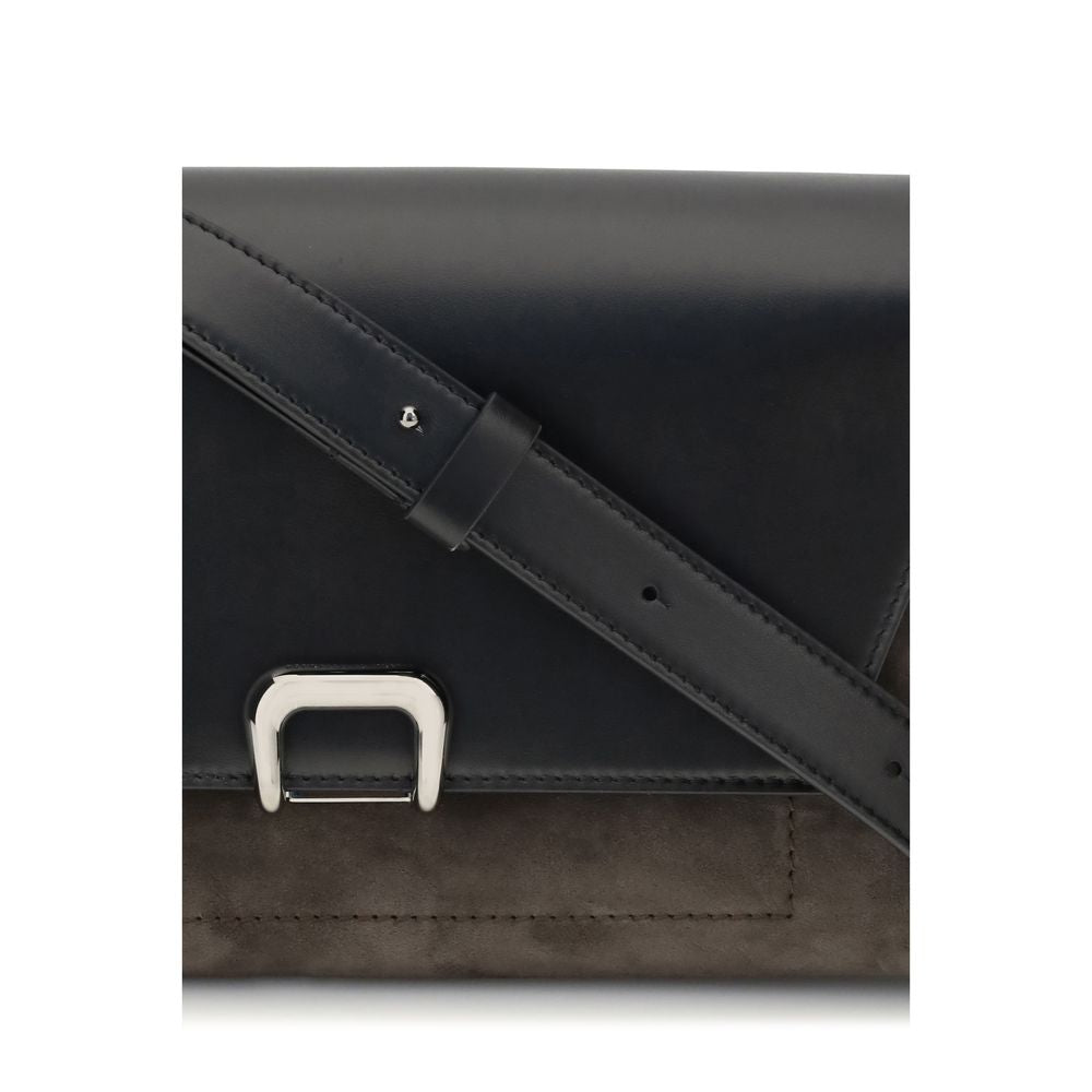 Brunello Cucinelli Black Leather Shoulder Bag with adjustable strap and magnet closure, close-up detail.