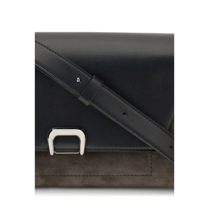 Brunello Cucinelli Black Leather Shoulder Bag with adjustable strap and magnet closure, close-up detail.