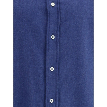 Front view of Brunello Cucinelli Blue Cotton Dress Shirt with button details and elegant monochrome pattern.