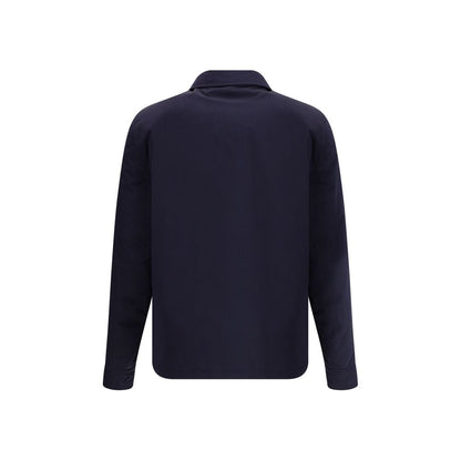 Back view of Brunello Cucinelli Blue Nylon Full-Length Jacket with classic collar and adjustable button cuffs.