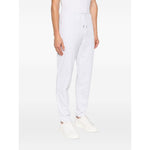 Brunello Cucinelli Cotton track pants in light grey with elasticated drawstring waistband and side slit pockets