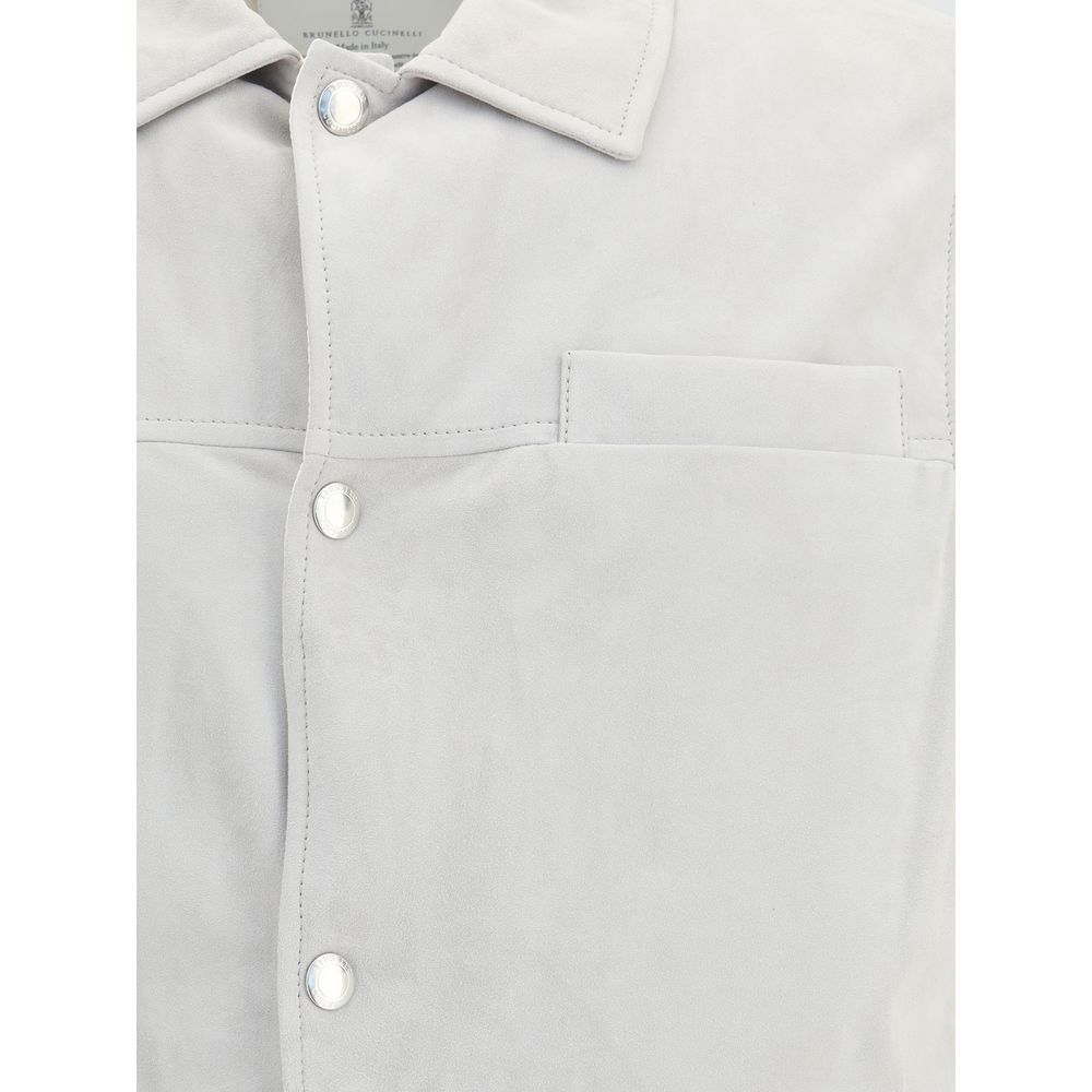 Brunello Cucinelli Gray Leather Jacket with snap-button closure and shirt-style collar highlighting its sophisticated design.