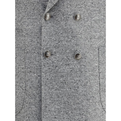 Close-up of Brunello Cucinelli Gray Wool Two-Piece Suit with metal buttons and patch pockets.