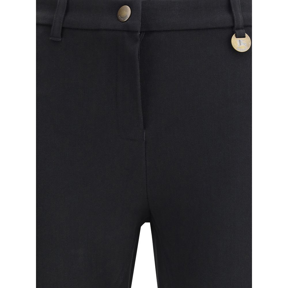 Burberry Black Cotton Casual Pants featuring herringbone pattern, hook-and-zip closure, and iconic Equestrian Knight Design. Slim fit style.