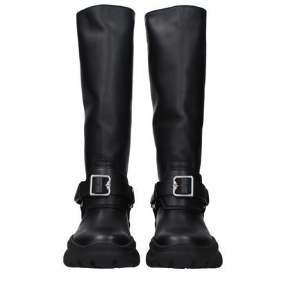 Burberry Black Leather Boots with front detail and vintage effect, featuring a silver buckle, round toe, and mid heels.