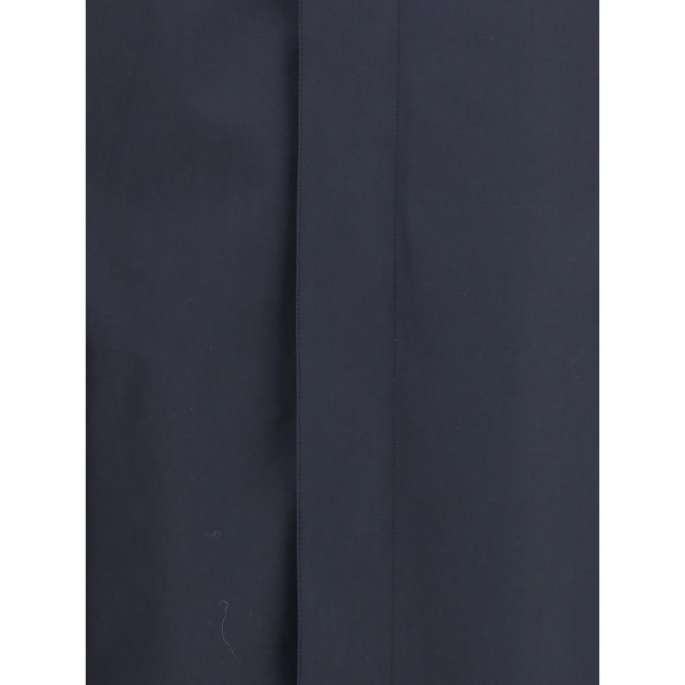 Close-up of Burberry Blue Cotton Coat fabric texture in navy color, showcasing high-quality craftsmanship and signature style details.