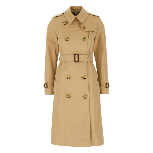 Burberry Double-breasted cotton trench coat in archive beige with classic details like epaulettes and adjustable waist belt.