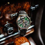 CASIO EDIFICE Mod. STANDARD CHRONOGRAPH GOLD - GREEN wristwatch with black leather strap, quartz movement, and chronograph function on display.