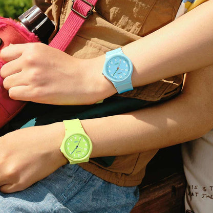 Alt Tag: CASIO TIMELESS COLLECTION Mod. POP - BIO RESIN STRAP - LEMON GREEN on wrist, paired with another colorful watch.
