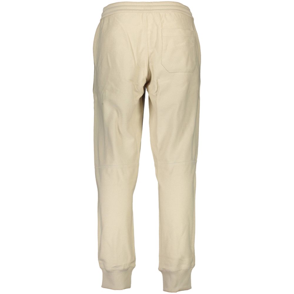 Back view of Calvin Klein Beige Cotton Men's Sweatpant, luxurious and comfortable, featuring ribbed cuffs and an understated design.