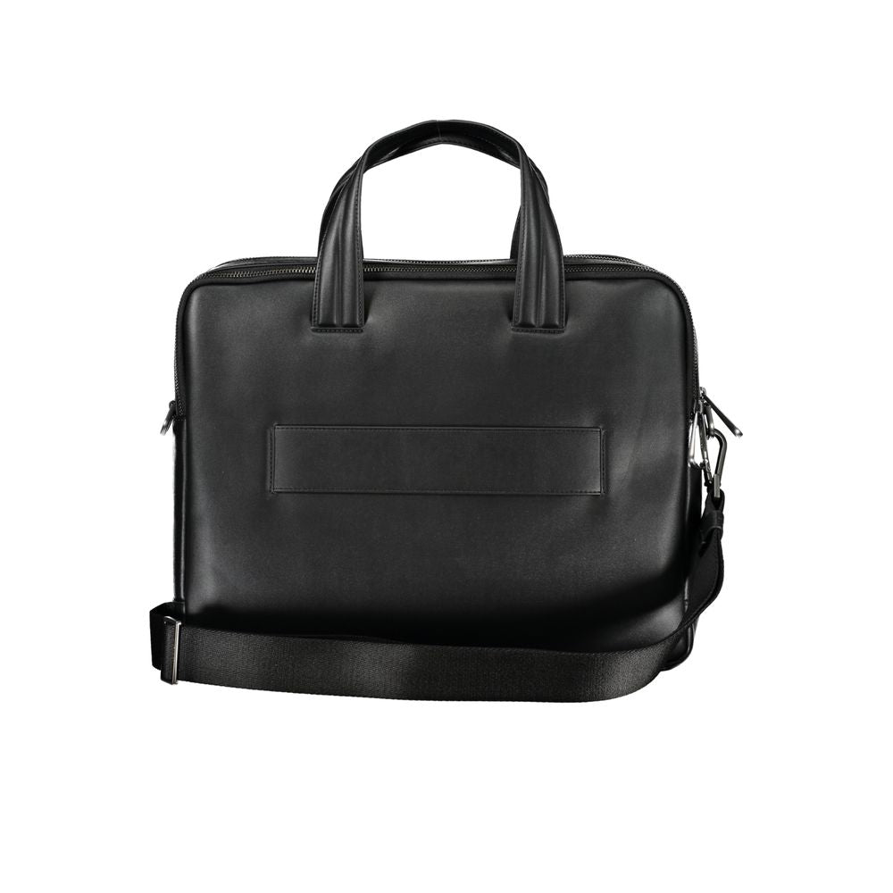 Calvin Klein Black Polyester Accessory briefcase with handles, adjustable strap, laptop compartment, and zip closure