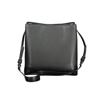Calvin Klein Black Polyester Handbag with adjustable shoulder strap, two compartments, central pocket, and logo.
