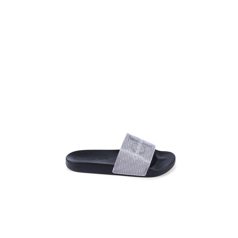 Calvin Klein Black Polyurethane Sandals for women in size 35, featuring a durable thermoplastic polyurethane strap; stylish and comfortable.