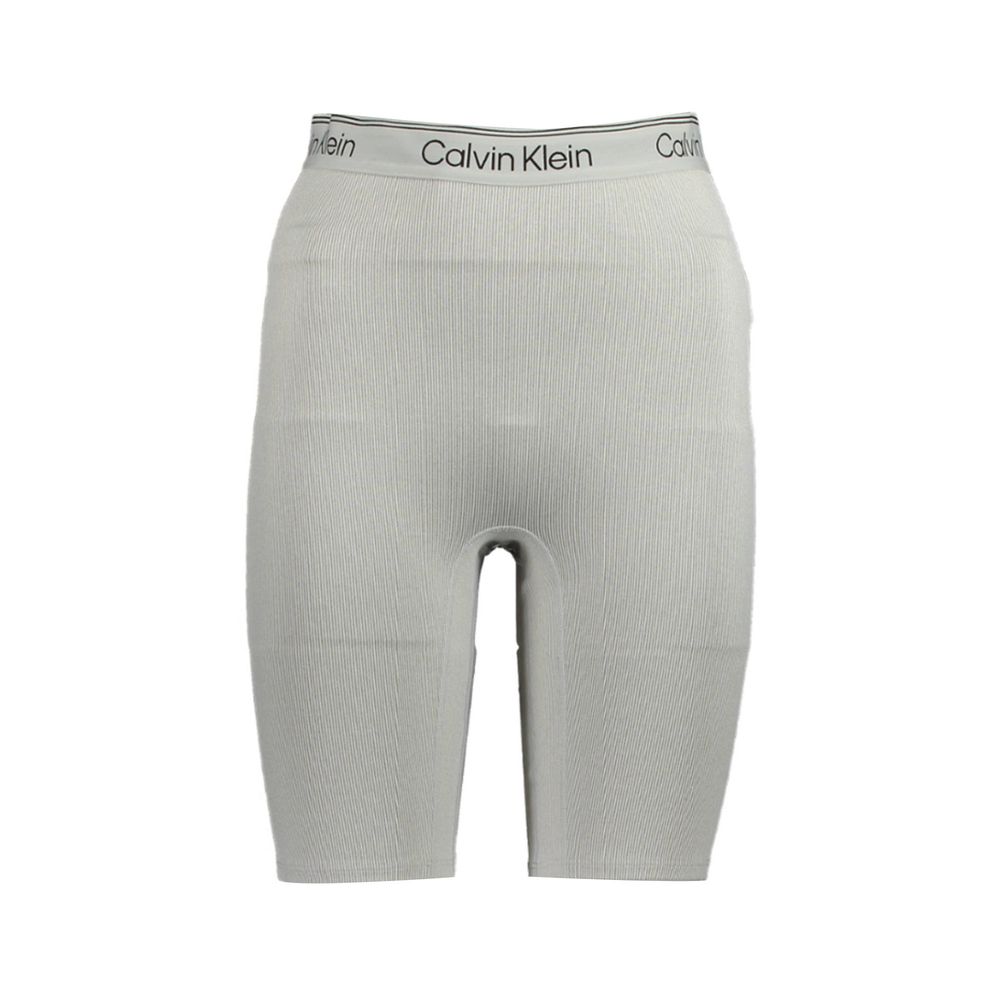 Calvin Klein Gray Polyester Pant featuring short gym shorts with elastic waistband, contrasting details, and logo print.