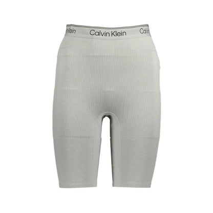 Calvin Klein Gray Polyester Pant featuring short gym shorts with elastic waistband, contrasting details, and logo print.