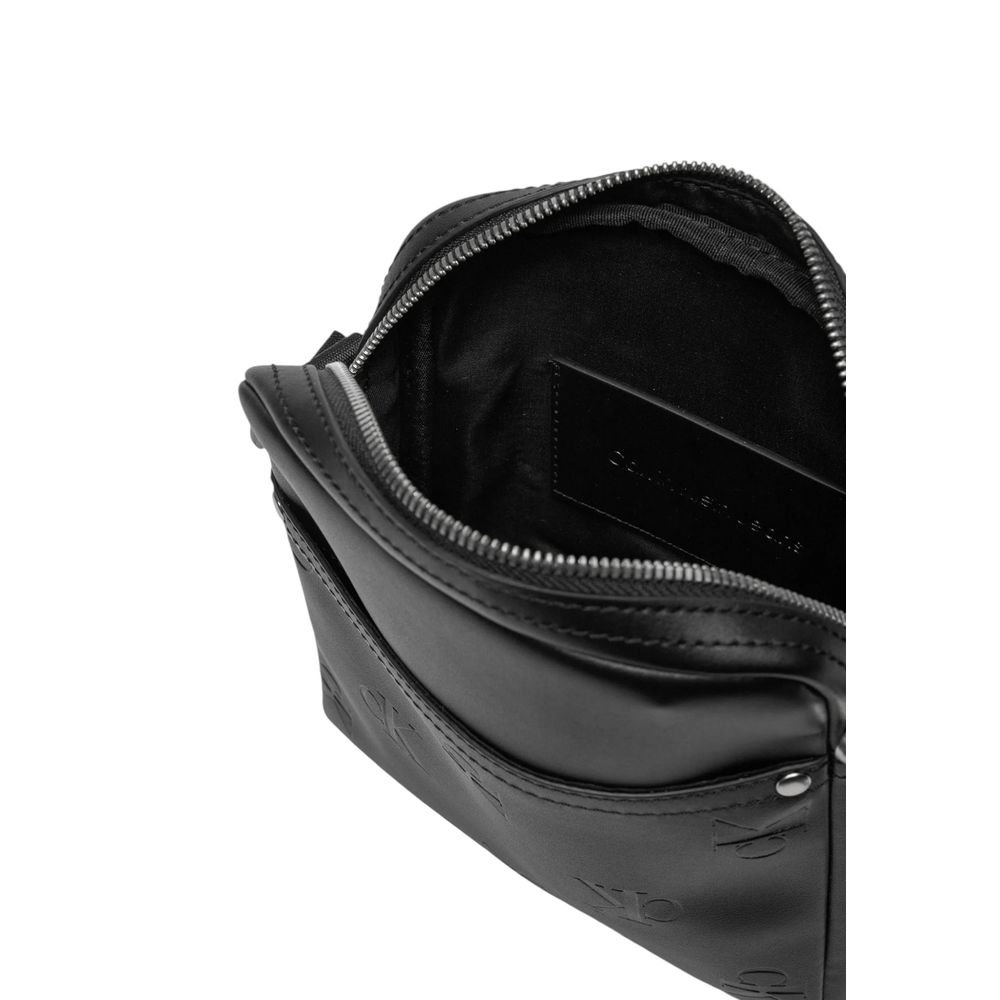 Open Calvin Klein Jeans Black Polyethylene Messenger Bag with visible interior showcasing sleek design and distinctive branding.