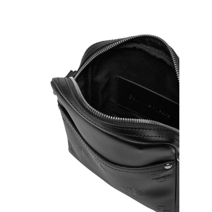 Open Calvin Klein Jeans Black Polyethylene Messenger Bag with visible interior showcasing sleek design and distinctive branding.
