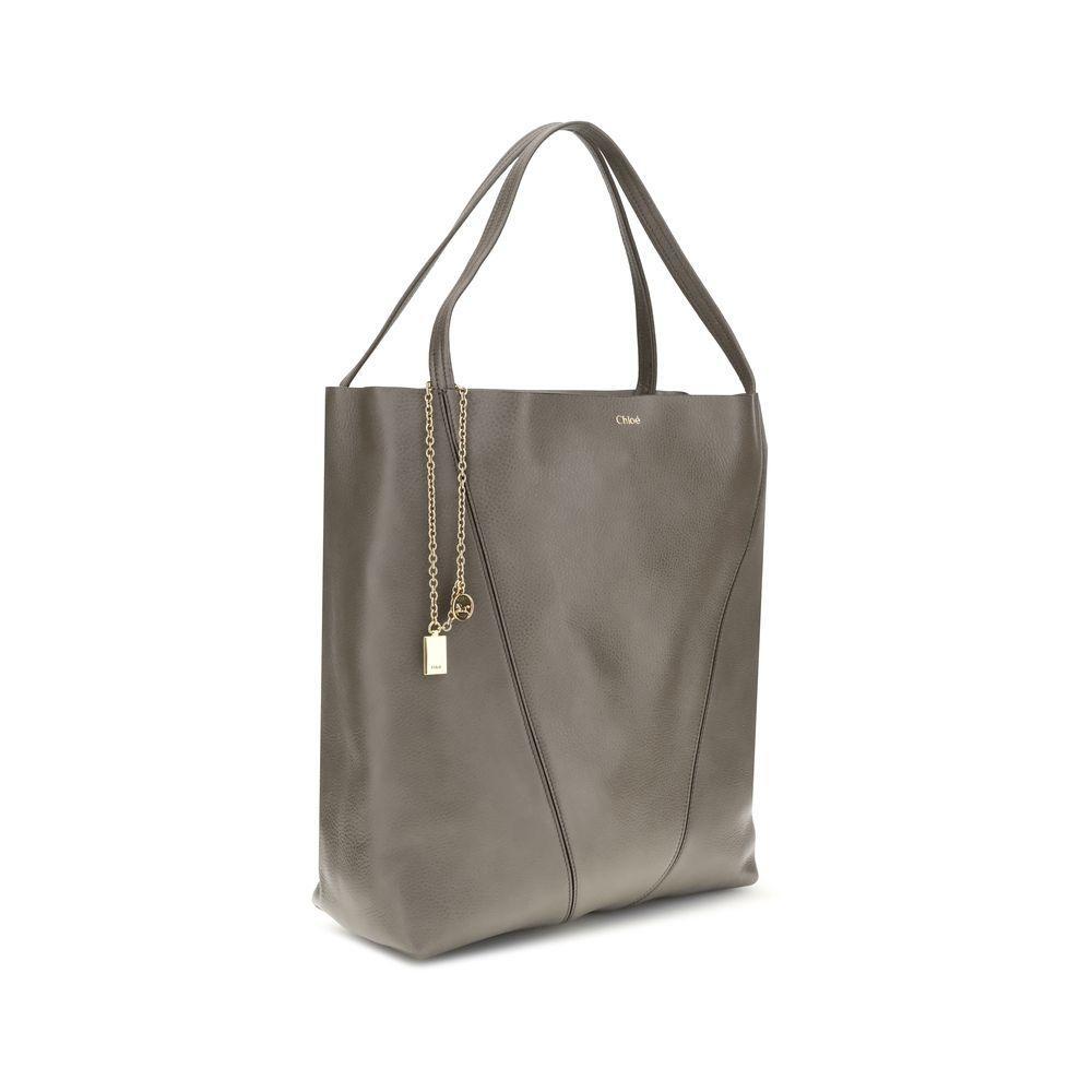 Front view with bag zipped and handles upright.