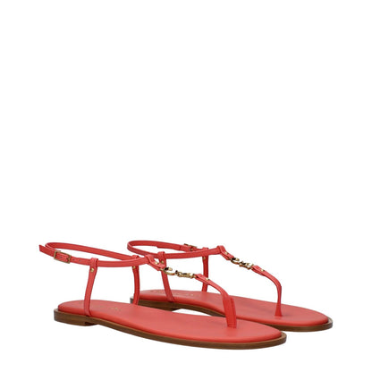 Christian Dior Pink Leather Flip-Flop Sandals with buckle closure and logo detail, featuring open toe and coral accents.
