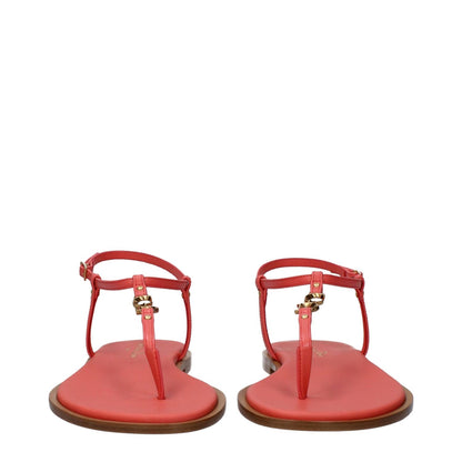Christian Dior Pink Leather Flip-Flop Sandals with buckle closure and logo, featuring coral accents, open toe, low heel.