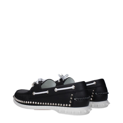 Christian Louboutin Black Leather Slip-On Loafers with studs, lace-up closure, rubber sole, round toe, low flat heel, MPN 3240230BK65.