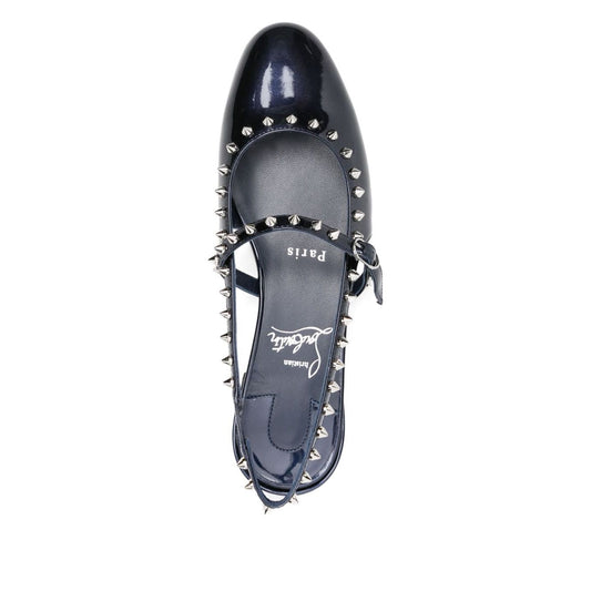 Top view of blue patent leather Christian Louboutin Sweet Janispikes Ballerinas with slingback and studs.