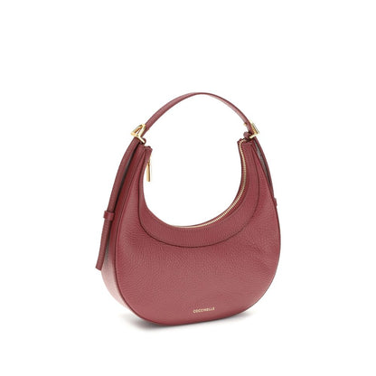 Coccinelle Red Calf Leather Bos Taurus Shoulder Bag with adjustable handle and secure zip closure, crafted from high-quality grained leather.