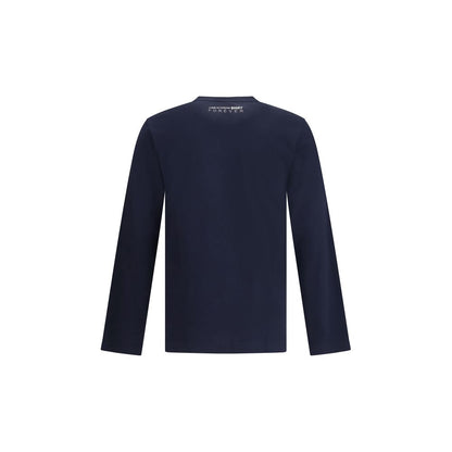 Back view of Comme Des Garçons Blue Cotton Long Sleeve T-Shirt with printed logo, showcasing crew neck and long sleeves, ideal for AW25.