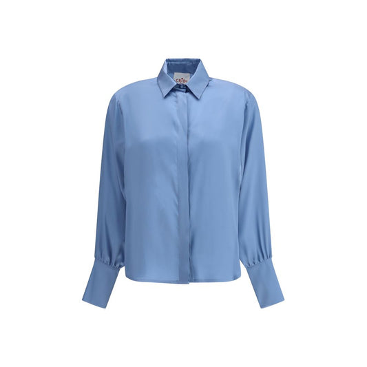 Crida Milano Light Blue Silk Shirt with smooth satin texture and classic collar design, showcasing minimalist elegance and timeless style.