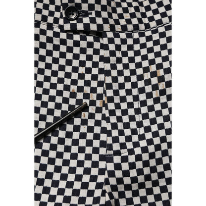 Detailed view of Daniele Alessandrini Black White Checkered Men Cropped Pants with button detail and checkered pattern.