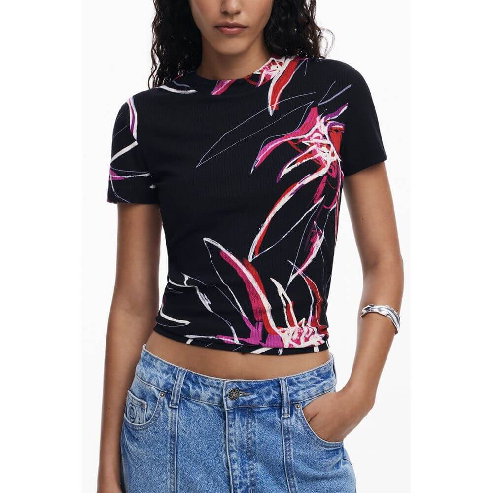 Desigual Black Viscose Women Top with bold floral print, crew neck, short sleeves, and logo detail, styled with casual jeans for eclectic charm.