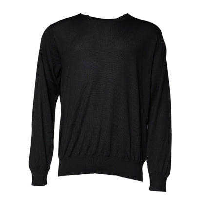 Dolce & Gabbana Black Cashmere Crew Neck Pullover Sweater with logo detail, featuring repaired holes on the left sleeve, made in Italy.