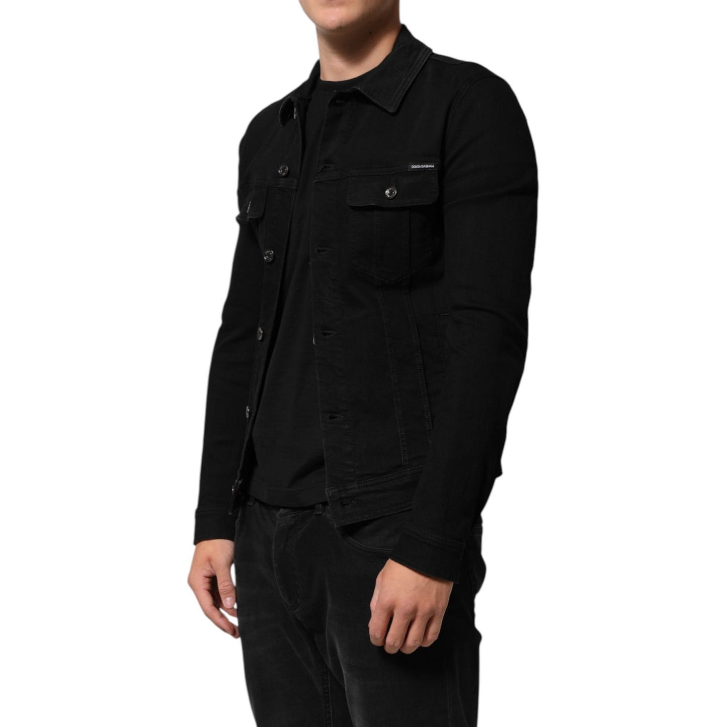 Dolce & Gabbana Black Cotton Denim Stretch Button Up Jacket with chest pockets and tailored fit, worn by a model.