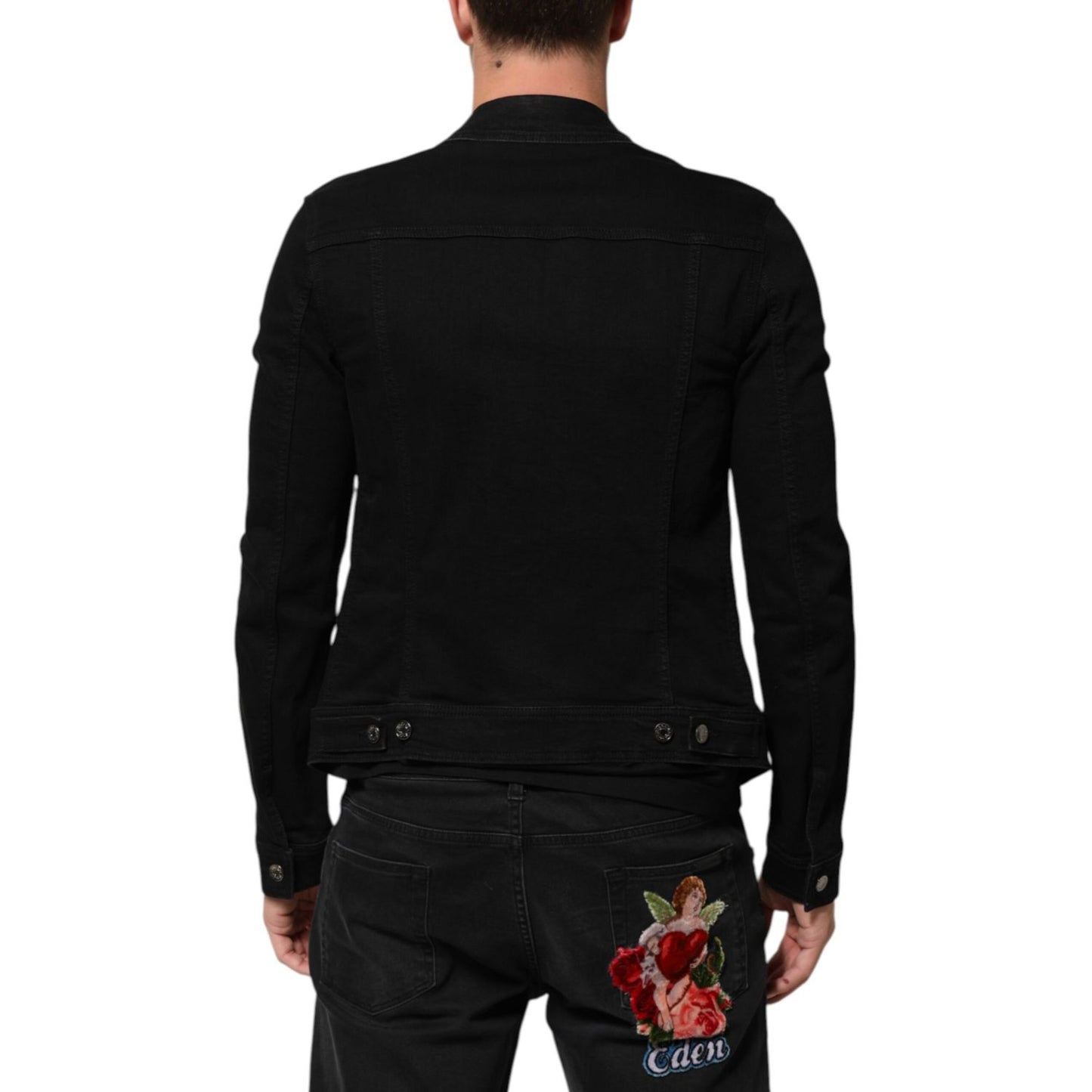 Back view of Dolce & Gabbana Black Cotton Denim Stretch Button Up Jacket on model, showcasing tailored fit and Italian craftsmanship.