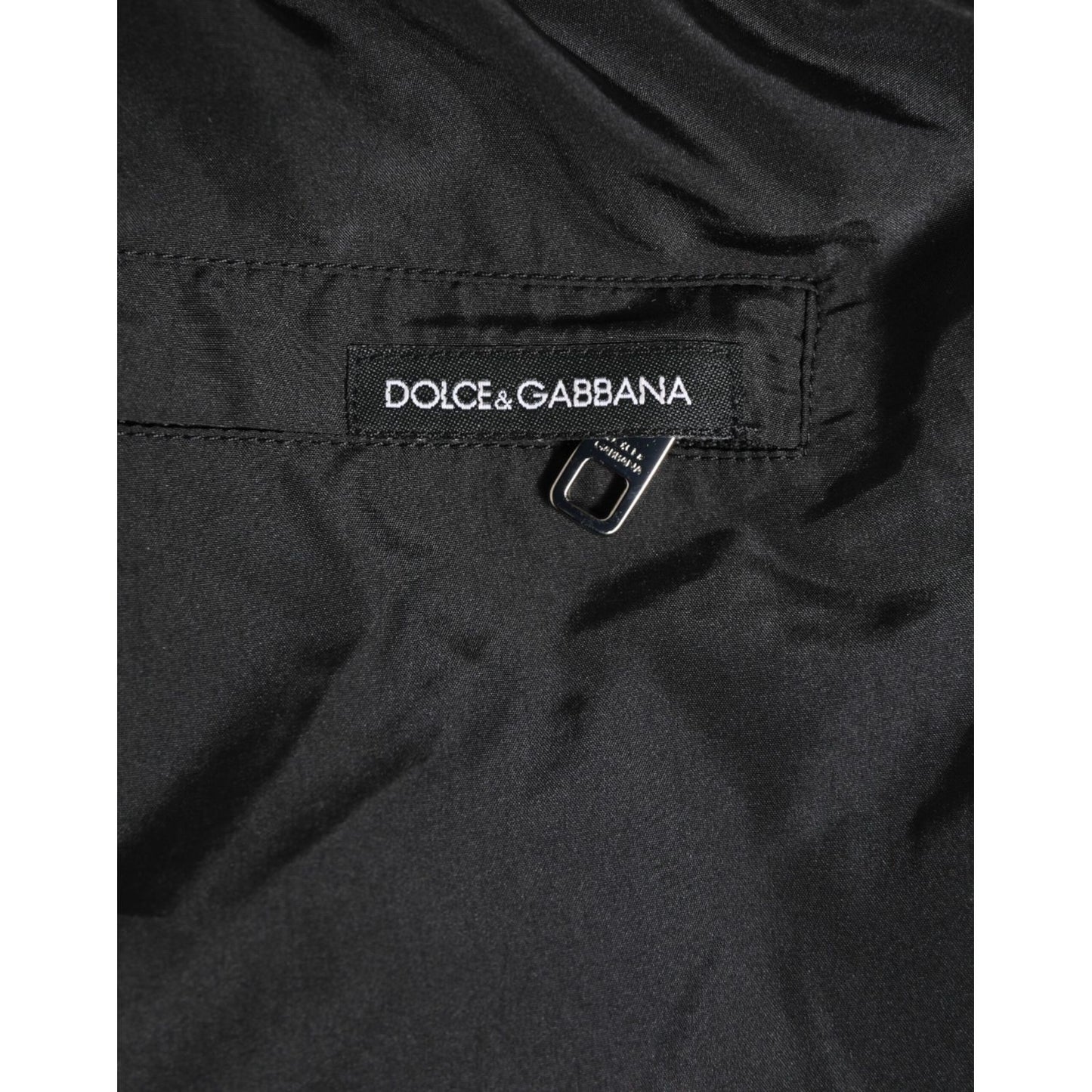 Label view of Dolce & Gabbana Black Nylon KING Sideband Men Boxer Shorts Swimwear with logo detailing.
