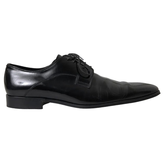 Dolce & Gabbana Black Polished Leather Formal Dress Shoes, preowned luxury men's footwear, high craftsmanship, black leather, exclusive design.