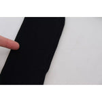 Close-up of Dolce & Gabbana Black Turtleneck Slim Fit Pullover Sweater fabric texture showing ribbed knitwear.